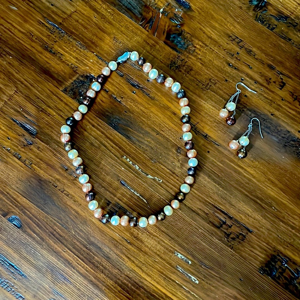 Pretty freshwater pearls. Necklace and dangling earrings. Necklace is 18 in